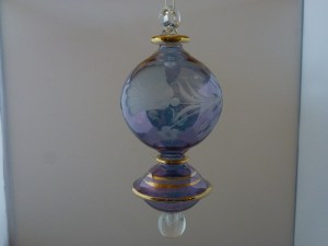 15 cm long, blue mouth blown, hand painted and hand cut SEK 120,-  Sending to you cost 20,- SEK extra. 